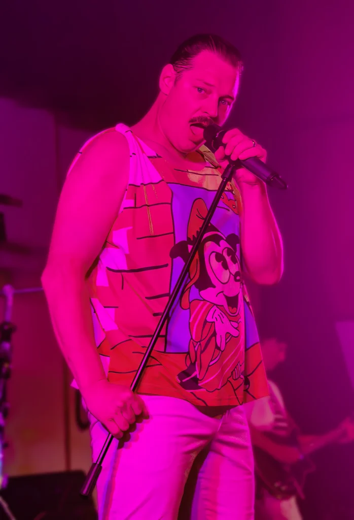Chris of Queen Champions performing as Freddie Mercury