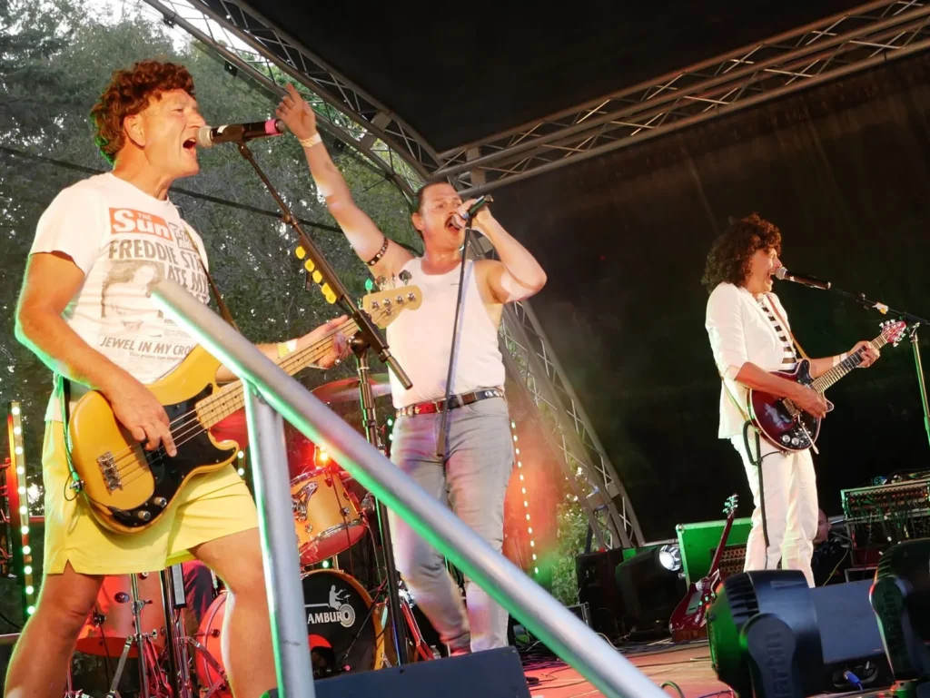 Queen Champions performing live together on stage