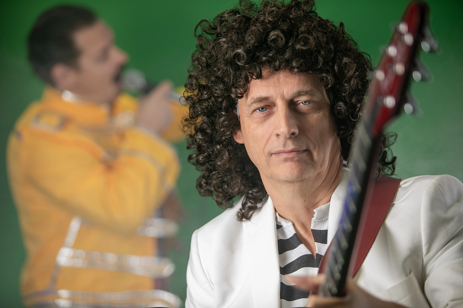 Matt of Queen Champions live Queen tribute band performing as Brian May